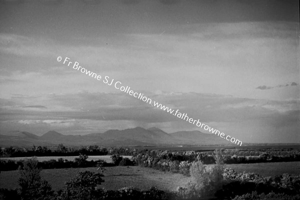 DISTANT VIEW OF CARLINGFORD AND MOURNE MOUNTAINS NEAR DILLONSTOWN